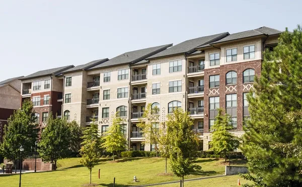 depositphotos_18354057-stock-photo-red-and-tan-brick-condos