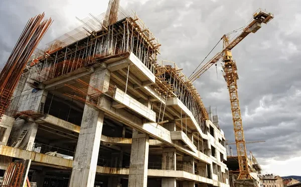 depositphotos_6151097-stock-photo-construction-site-with-crane-and